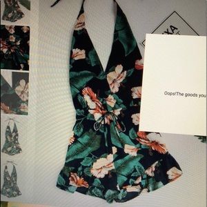 Low-cut open back floral romper